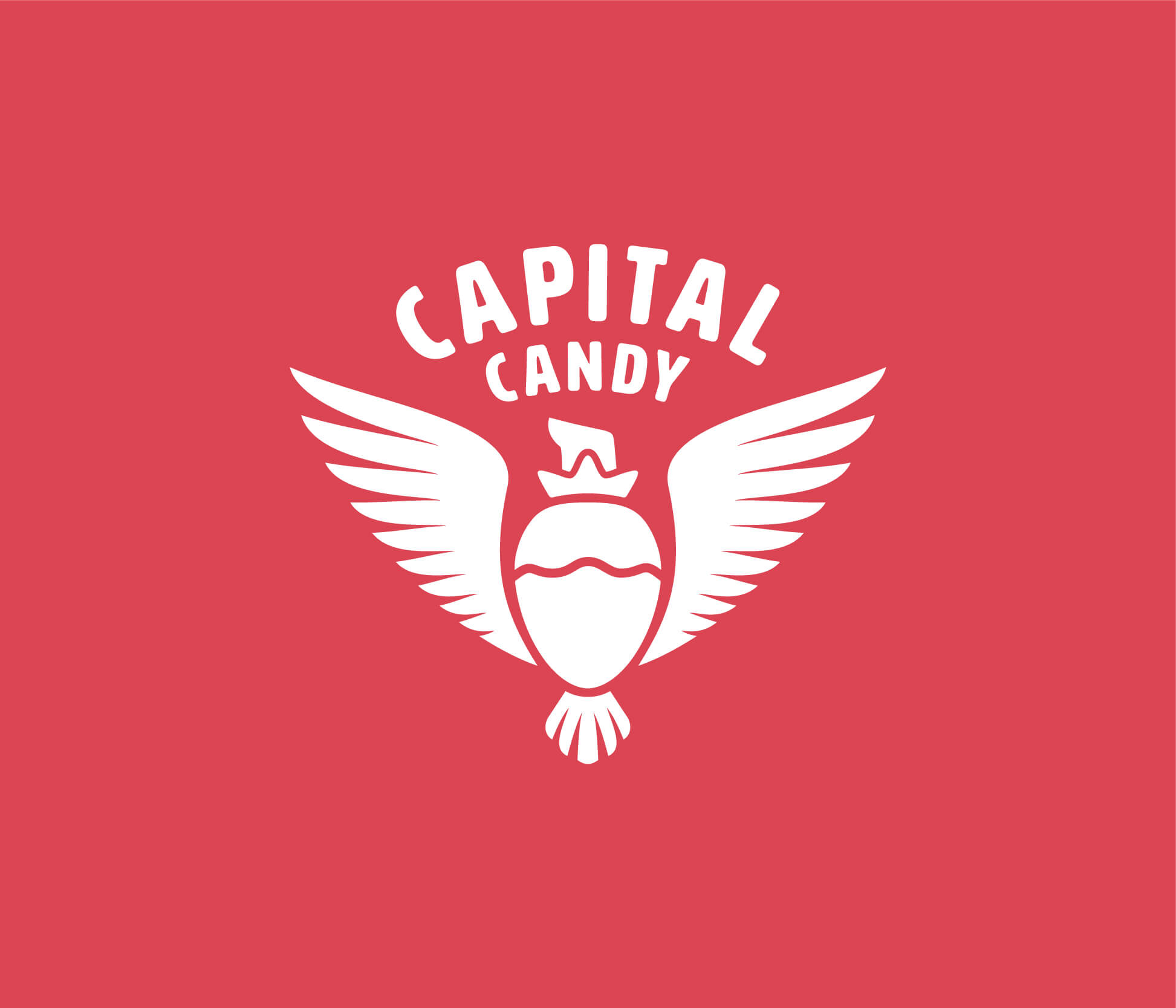 Capital Candy logo in black on a red background, showing the silhouette version for brand color applications